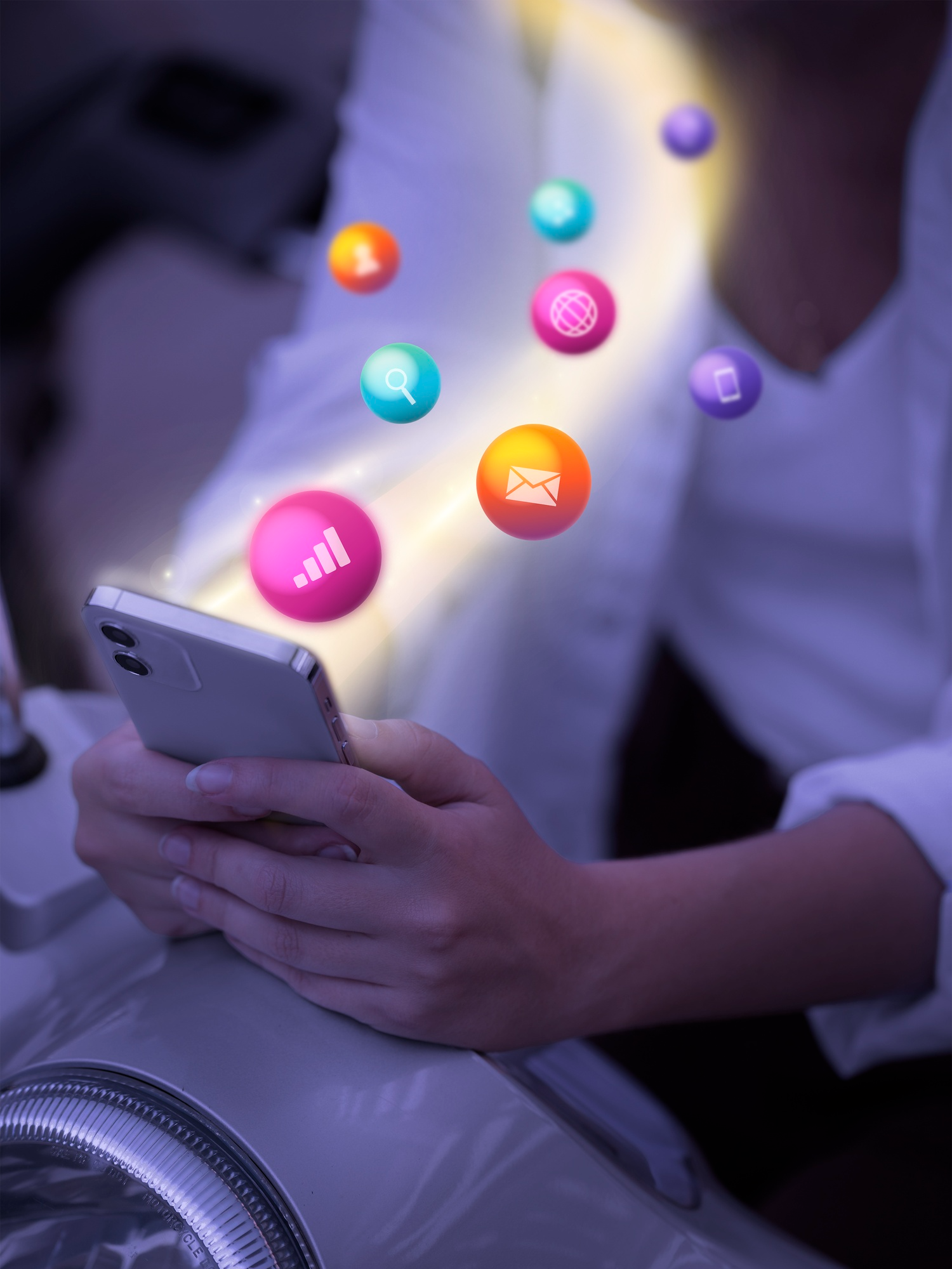 Viewer holding a phone with colorful app icons floating above it